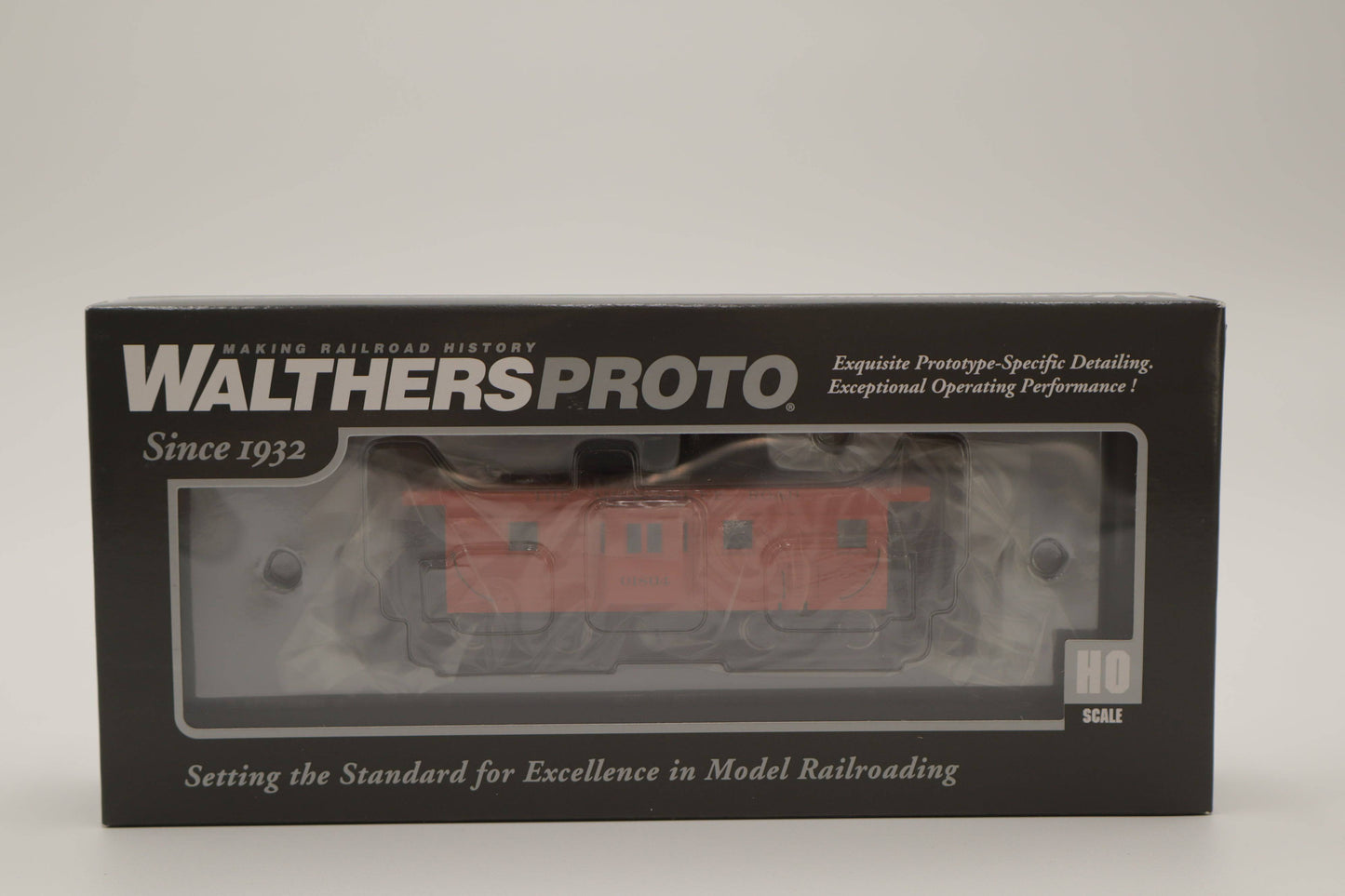 Walthers HO 920-103652 - Proto - Rib Sided Caboose "Milwaukee Road" #01870 (Orange, Maroon; Includes Coal Stove)