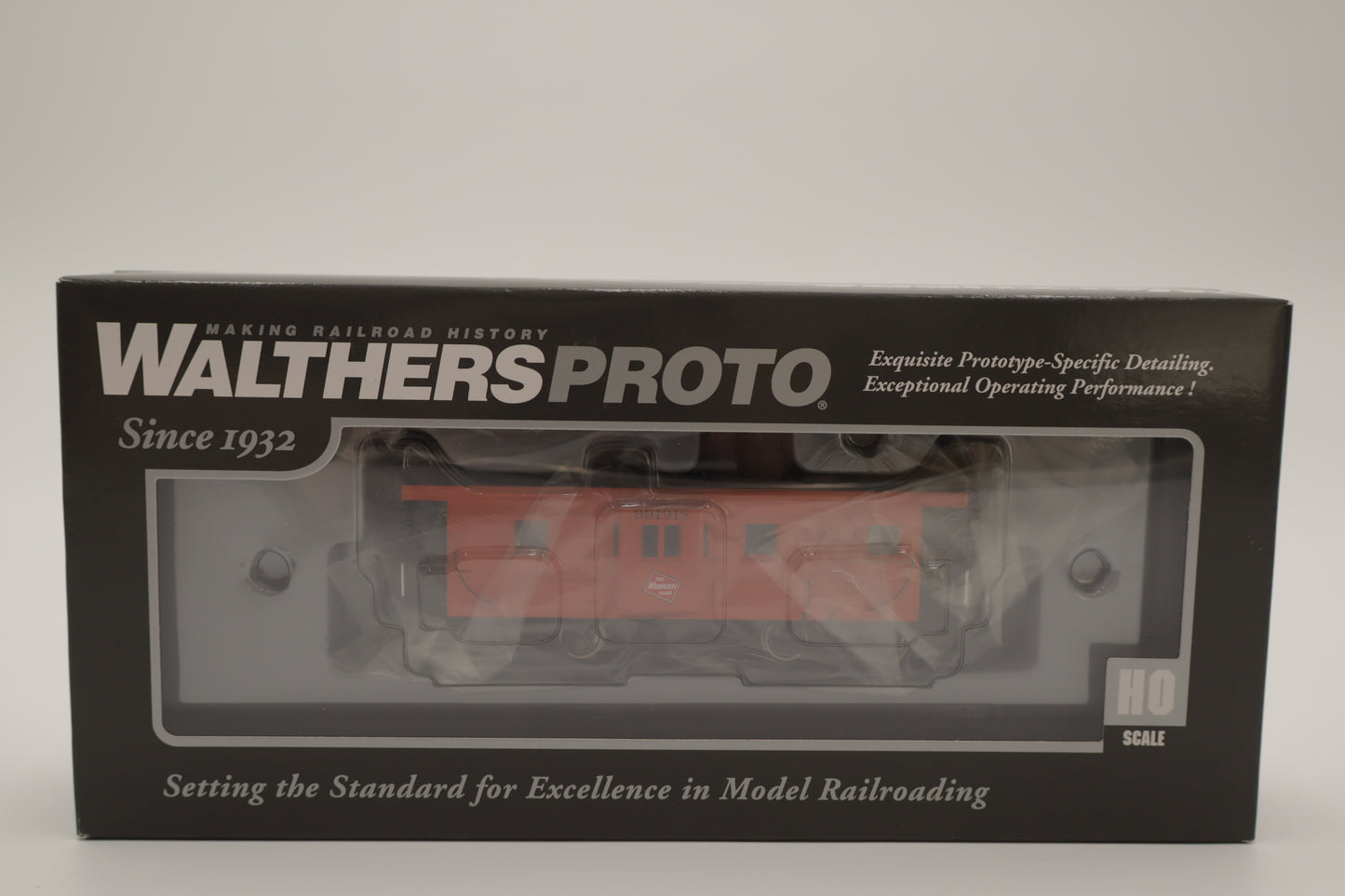 Walthers HO 920-103653 - Proto -  Rib Sided Caboose "Milwaukee Road" #991918 (Orange, Black, Yellow; Includes Oil Stove)