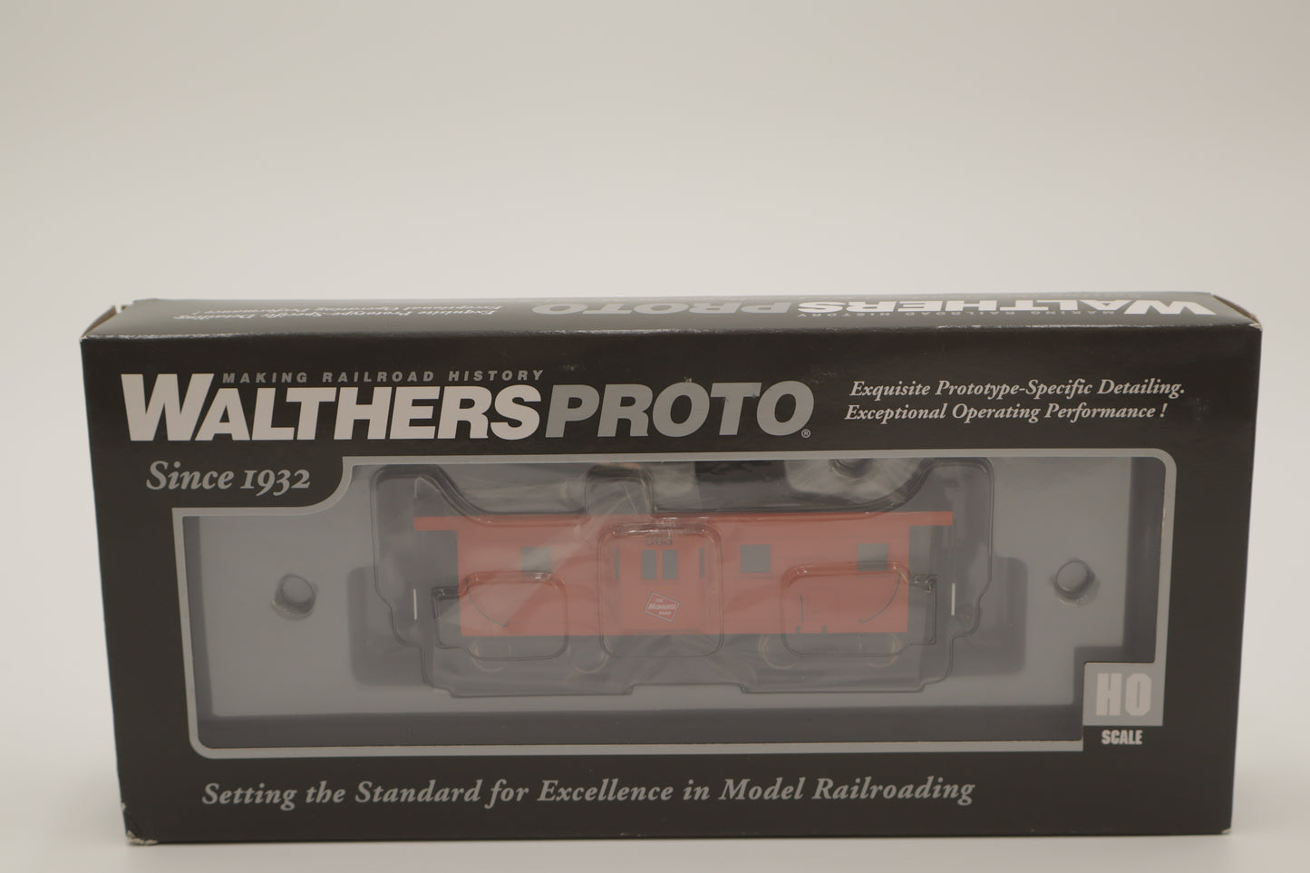 Walthers HO 920-103657 - Proto - Rib Sided Caboose "Milwaukee Road" #063 (Orange, Black; Includes Oil Stove)