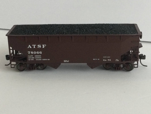 Model train car with 'ATSF' branding on a white background