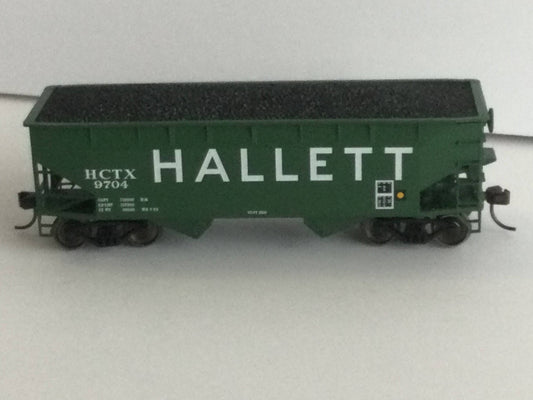 Model train car with 'Hallett' branding on a white background