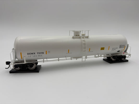 Model of a tank car with 'DOWX 73178' on a gray background