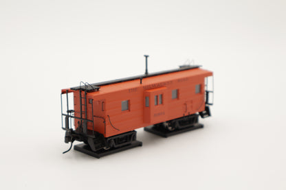 Walthers HO 920-103652 - Proto -  Rib Sided Caboose "Milwaukee Road" #01870 (Orange, Maroon; Includes Coal Stove)
