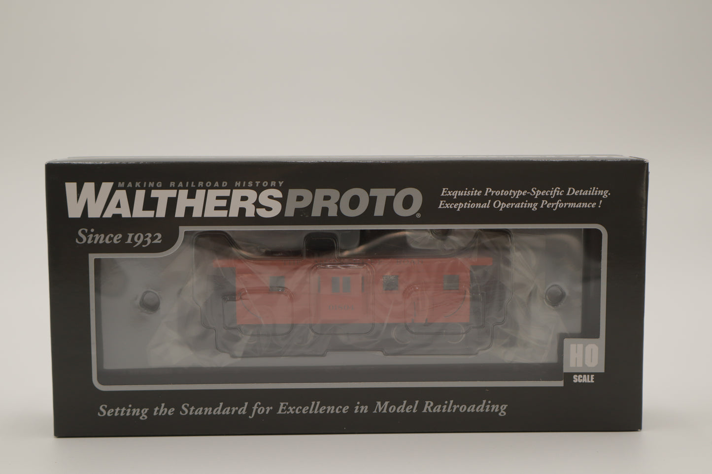 Walthers HO 920-103652 - Proto -  Rib Sided Caboose "Milwaukee Road" #01870 (Orange, Maroon; Includes Coal Stove)