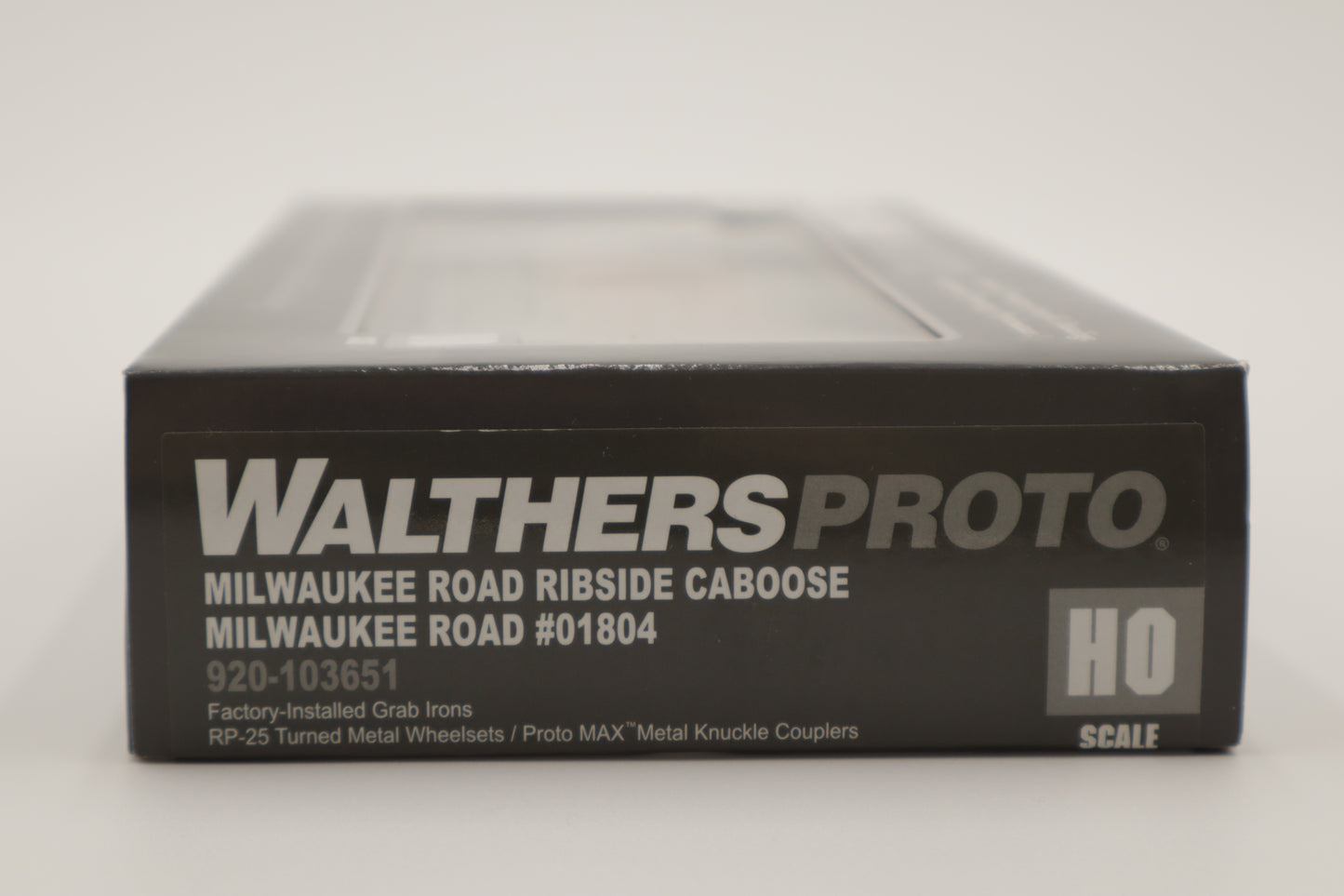 Walthers HO 920-103651 - Proto -  Rib Sided Caboose "Milwaukee Road" #01804 (Orange, Maroon; Includes Coal Stove)