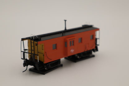 Walthers HO 920-103653 - Proto -  Rib Sided Caboose "Milwaukee Road" #991918 (Orange, Black, Yellow; Includes Oil Stove)