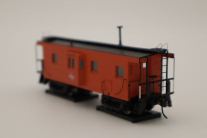 Walthers HO 920-103656 - Proto -  Rib Sided Caboose "Milwaukee Road" #991898 (Orange, Black; Includes Oil Stove)