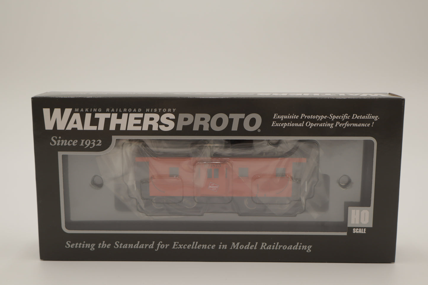 Walthers HO 920-103655 - Proto -  Rib Sided Caboose "Milwaukee Road" #991875 (Orange, Black; Includes Oil Stove)