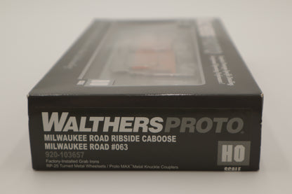 Walthers HO 920-103657 - Proto -  Rib Sided Caboose "Milwaukee Road" #063 (Orange, Black; Includes Oil Stove)
