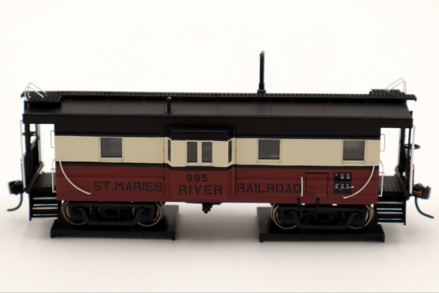 Walthers HO 920-103661 - Proto -  Rib Sided Caboose "St. Marie's River Railroad" #996 (Red, White, Black; Includes Oil Stove)