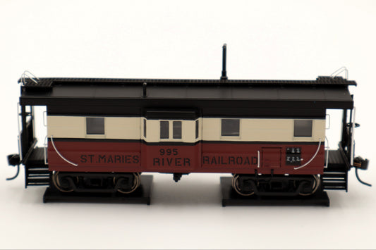 Walthers HO 920-103660 - Proto -  Rib Sided Caboose "St. Marie's River Railroad" #995 (Red, White, Black; Includes Oil Stove)