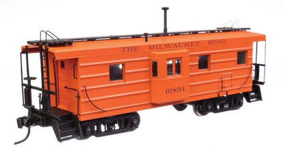 Walthers HO 920-103651 - Proto -  Rib Sided Caboose "Milwaukee Road" #01804 (Orange, Maroon; Includes Coal Stove)